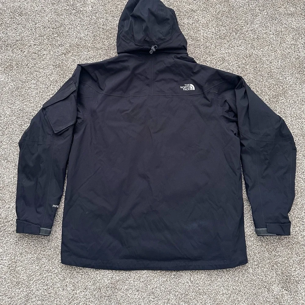 The North Face Black Hooded Raincoat with Multiple Front Pockets